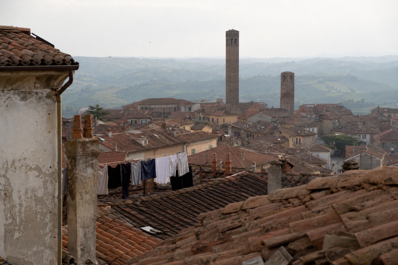Alba's rooftops and the Langhe hills beyond.