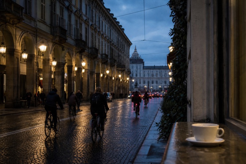 Category card showing cyclists passing baroque arcades and Piazza Castello in the centre of Turin